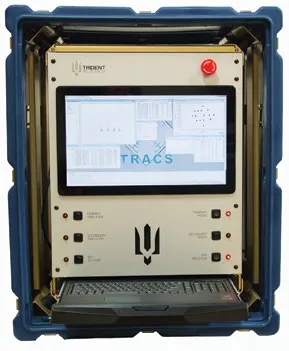 The Trident TRACS command and control unit in a blue rugged case: a flat-screen display above a row of switches and indicator lights, with a keyboard tray below